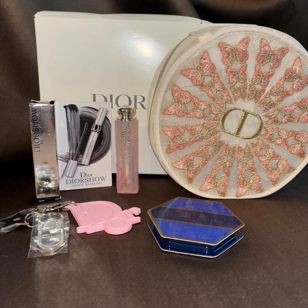 Dior Set: Makeup Bag, Creme to powder compact, Mascara, Lip Glow, and a keychain